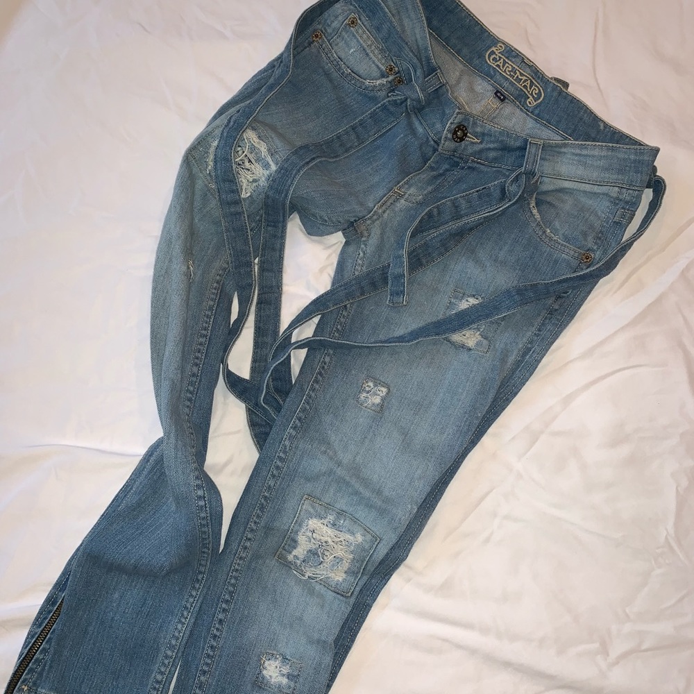 Jeans with overall straps
